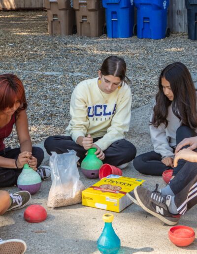 LEAP students making enrichment toys for the animals.