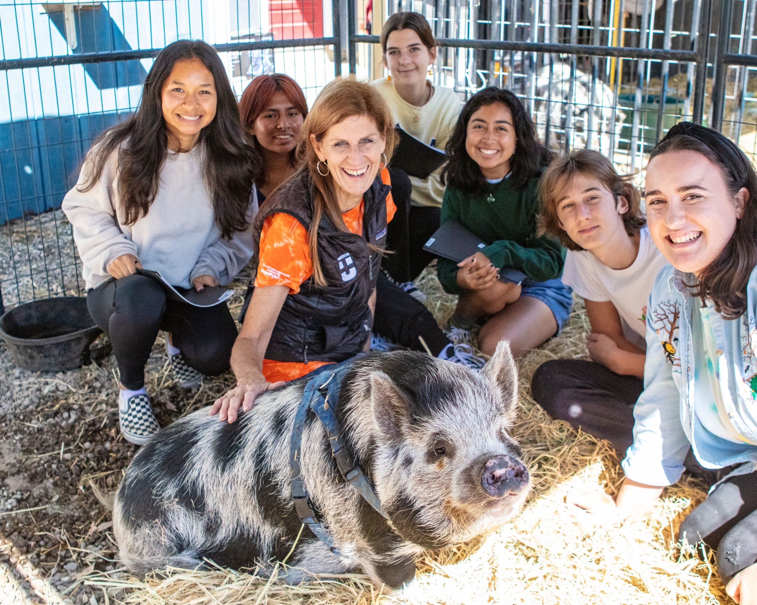 LEAP students and leaders at Jameson Humane with Obi the pig.
